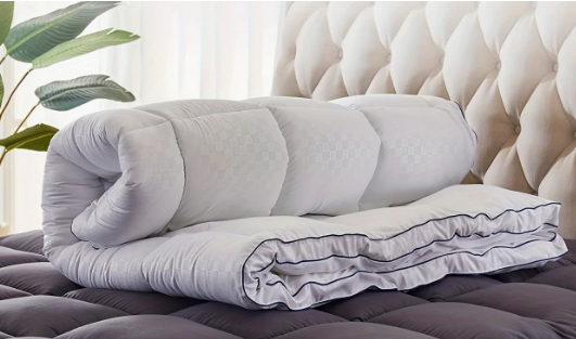 White mattress with fitted sheet